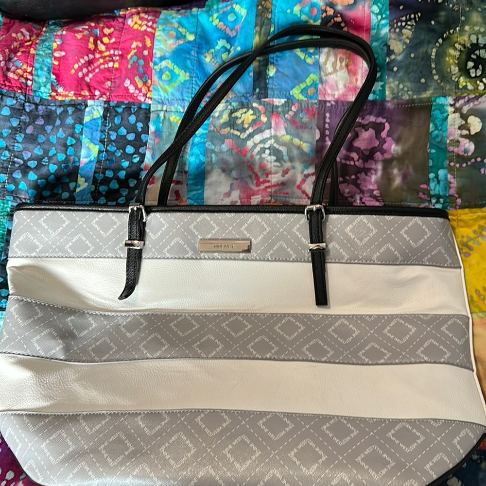Womens’s gray and white striped purse with black handles